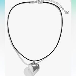 Chrome silver heart necklace, can be work as a choker and is adjustable in size